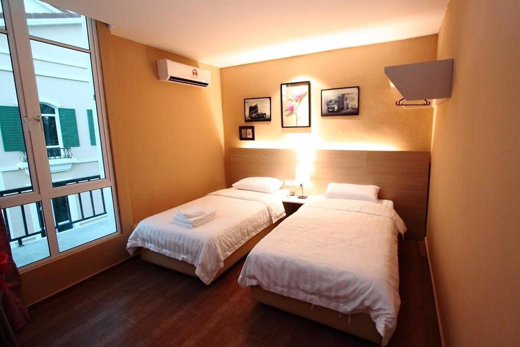 91 Street Boutique Inn Miri Quarto foto