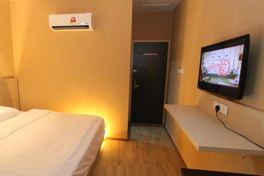 91 Street Boutique Inn Miri Quarto foto